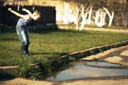 kid playing in dirt